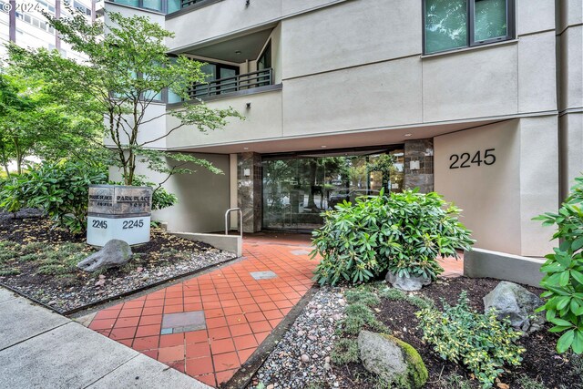 doorway to property with a balcony