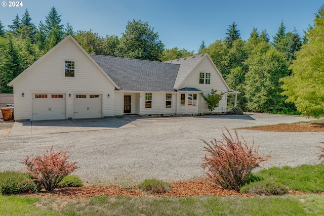 view of front of home with a garage