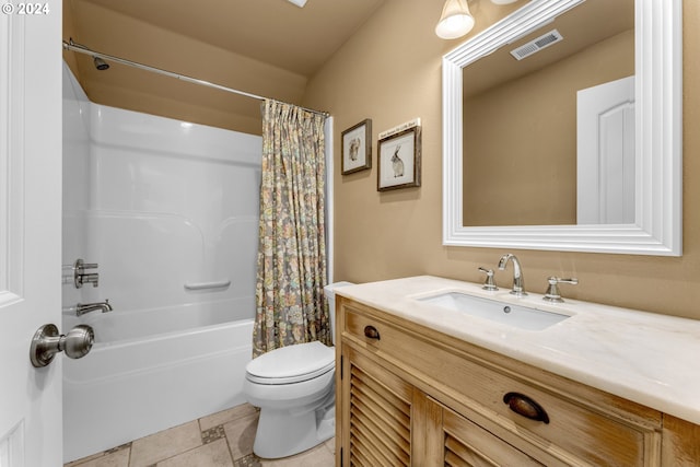 full bathroom featuring shower / tub combo with curtain, vanity, and toilet