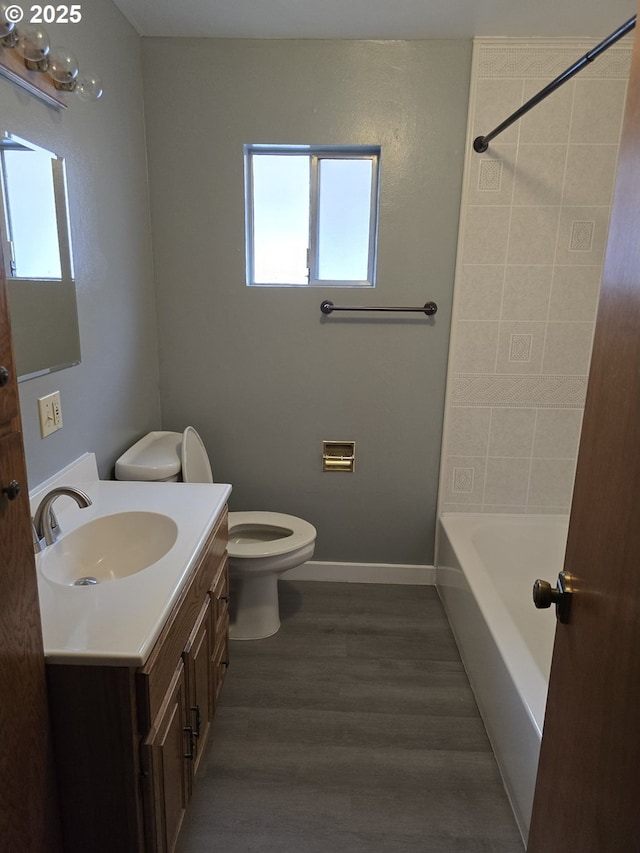 40 NW Cary St, Winston, OR 97496 - full bath featuring toilet, wood finished floors, shower / bath combination, baseboards, and vanity