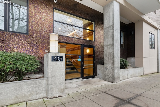 property entrance featuring french doors