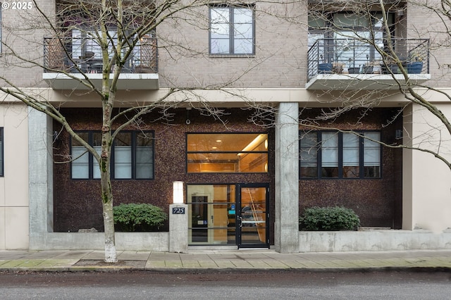 property entrance with a balcony