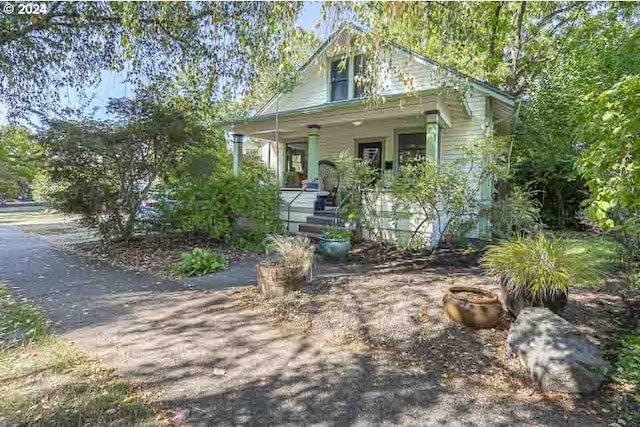 bungalow-style house featuring covered porch