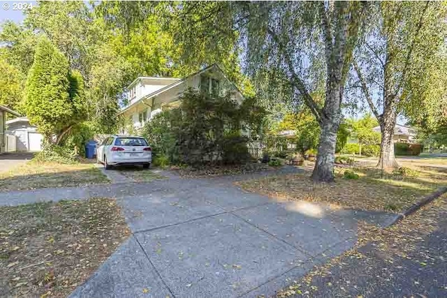 view of property exterior with driveway