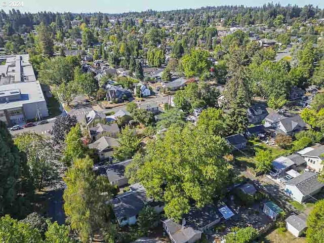 aerial overview of property's location with nearby suburban area