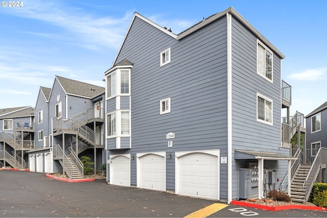 view of property exterior featuring a garage