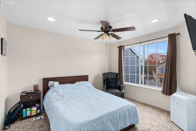 carpeted bedroom with ceiling fan