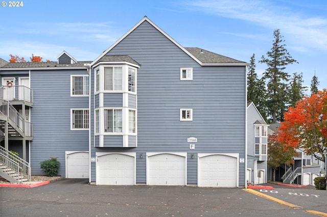 view of property exterior featuring a garage