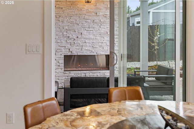 4116 S 16th Way, Ridgefield, WA 98642 - dining room featuring a fireplace and plenty of natural light