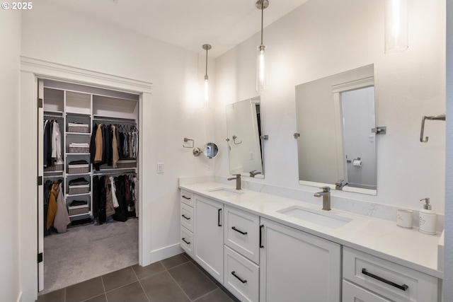 4116 S 16th Way, Ridgefield, WA 98642 - full bath with tile patterned floors, a spacious closet, double vanity, and baseboards