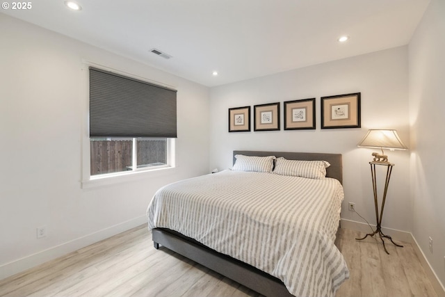 4116 S 16th Way, Ridgefield, WA 98642 - bedroom with light wood-style floors, baseboards, and recessed lighting