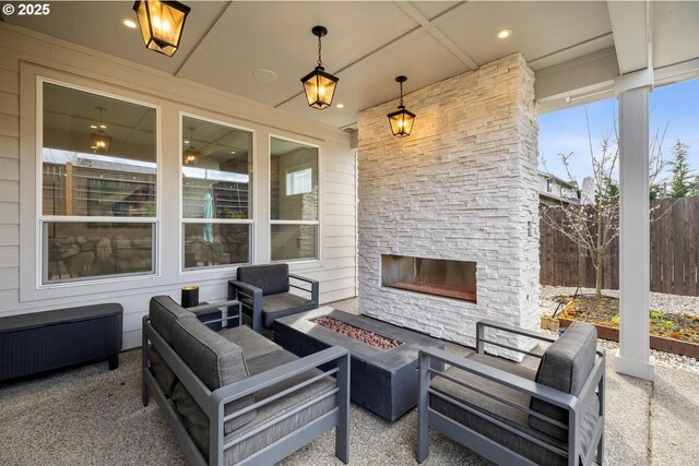 4116 S 16th Way, Ridgefield, WA 98642 - view of patio / terrace featuring an outdoor living space with a fireplace
