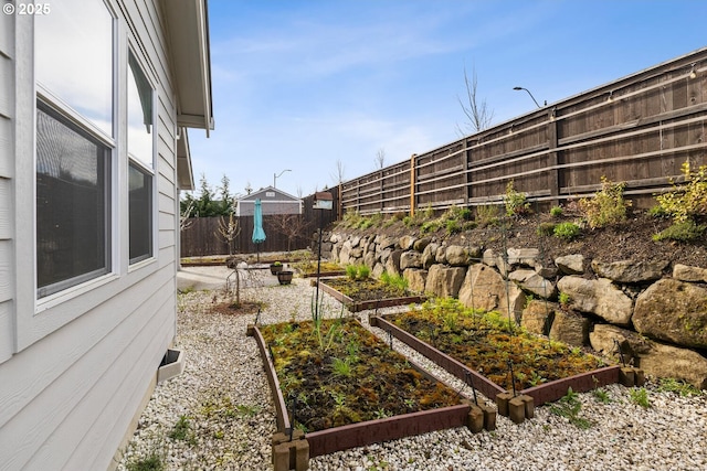 4116 S 16th Way, Ridgefield, WA 98642 - fenced backyard with a garden