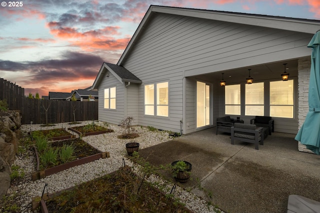 4116 S 16th Way, Ridgefield, WA 98642 - back of property featuring a garden, a patio area, and outdoor lounge area
