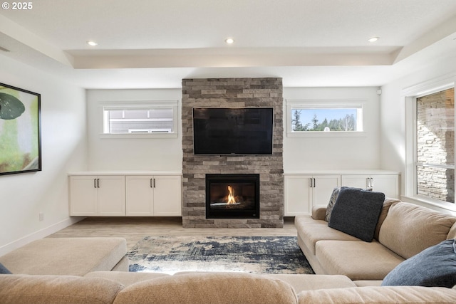 4116 S 16th Way, Ridgefield, WA 98642 - living area featuring healthy amount of natural light, light wood-type flooring, a tray ceiling, and recessed lighting