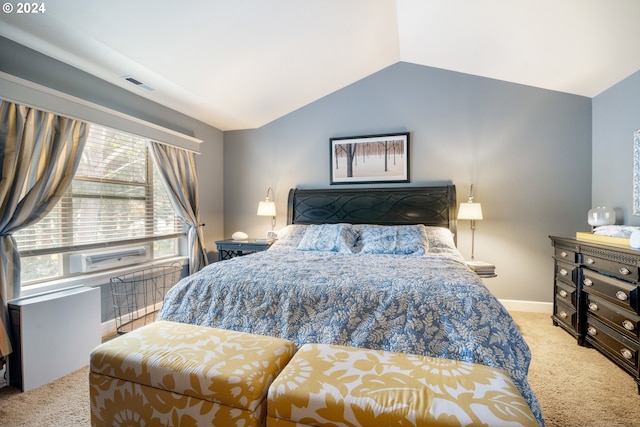 carpeted bedroom featuring vaulted ceiling