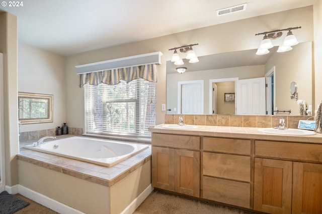 bathroom featuring a bathtub and vanity