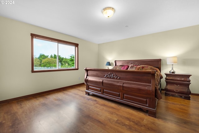 402 Diamond Ln, Gearhart, OR 97138 - bedroom featuring baseboards and wood finished floors