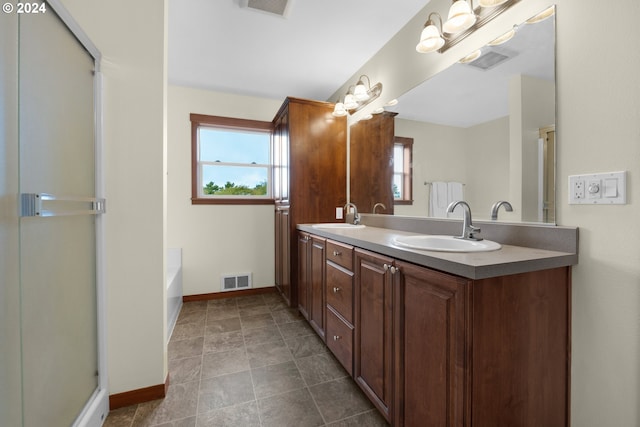402 Diamond Ln, Gearhart, OR 97138 - bathroom with plenty of natural light, a sink, and a shower with door