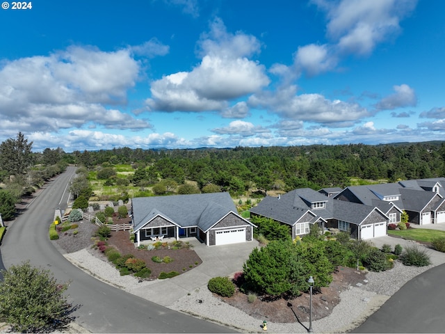402 Diamond Ln, Gearhart, OR 97138 - aerial view with a residential view and a wooded view