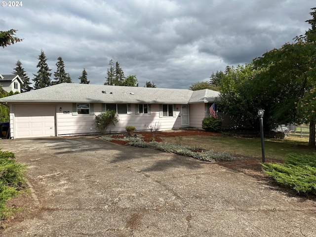 single story home with a garage