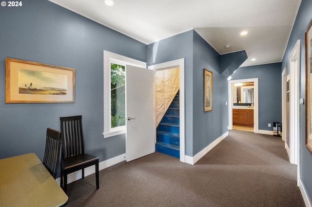 interior space with dark colored carpet