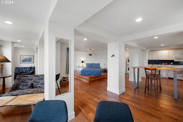 bedroom with hardwood / wood-style flooring