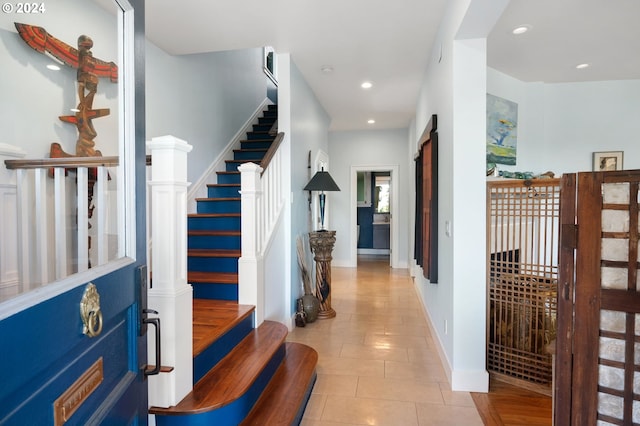 foyer with light tile patterned flooring