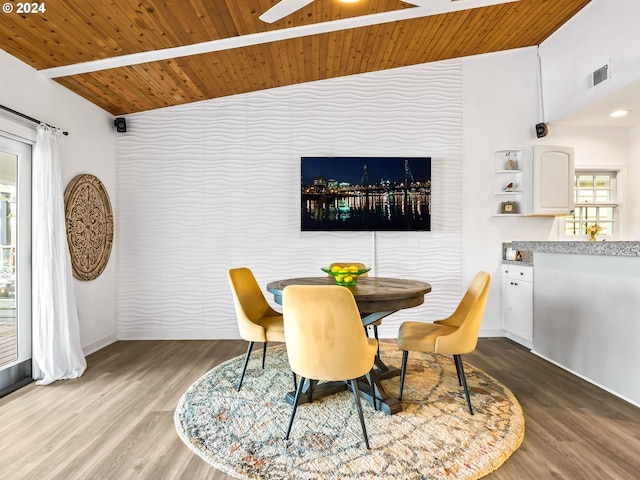 dining area with wood ceiling, hardwood / wood-style floors, ceiling fan, and vaulted ceiling