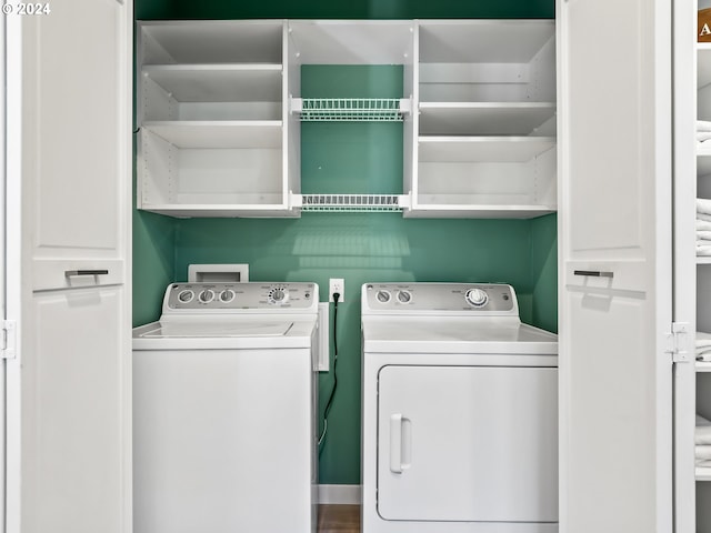 washroom featuring independent washer and dryer