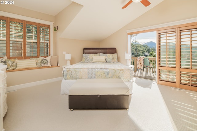 bedroom with ceiling fan, access to exterior, lofted ceiling, and carpet