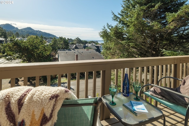 balcony featuring a mountain view