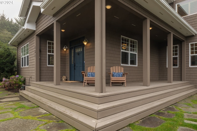 wooden deck featuring covered porch