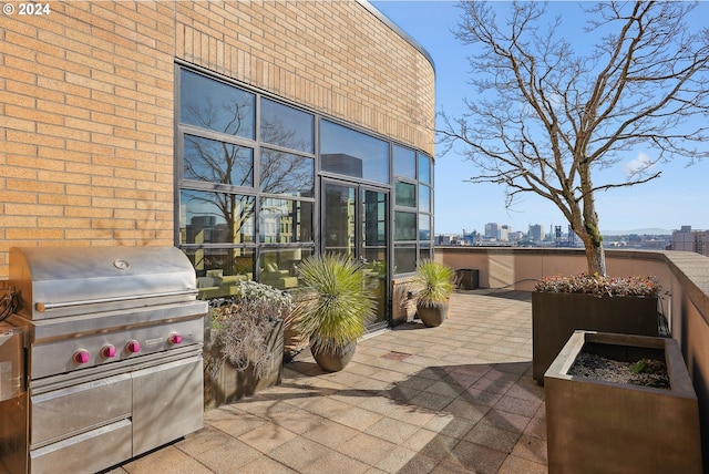 view of patio / terrace with a grill