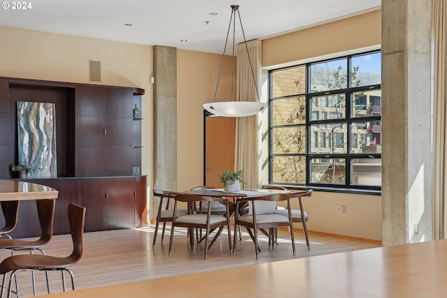 dining room featuring light hardwood / wood-style flooring