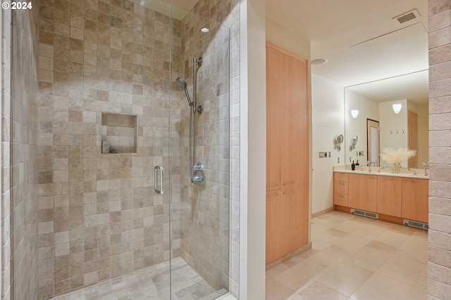 bathroom with vanity and walk in shower