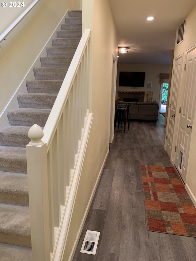 interior space with dark wood-type flooring