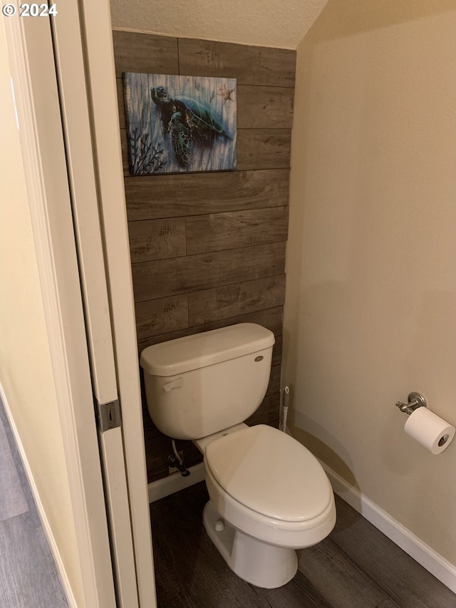 bathroom featuring a textured ceiling and toilet