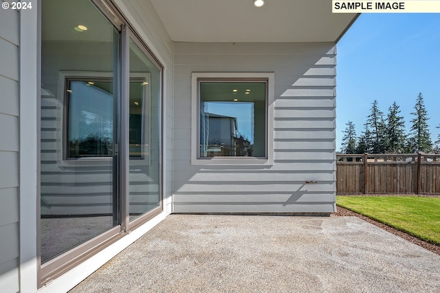 exterior space featuring a patio and a yard