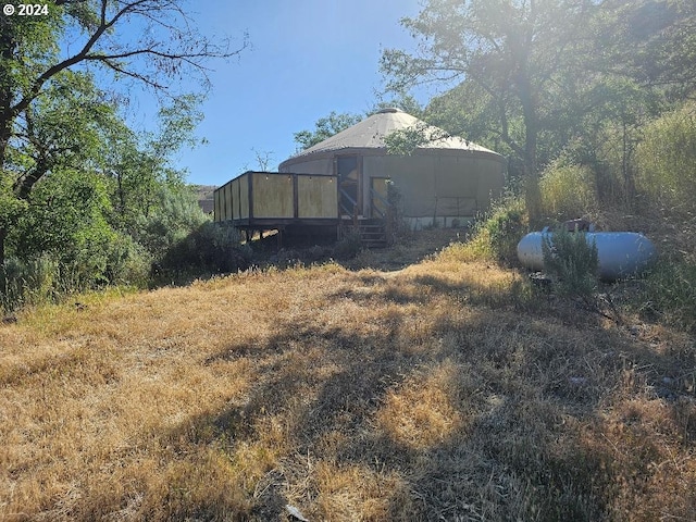 view of yard with a deck