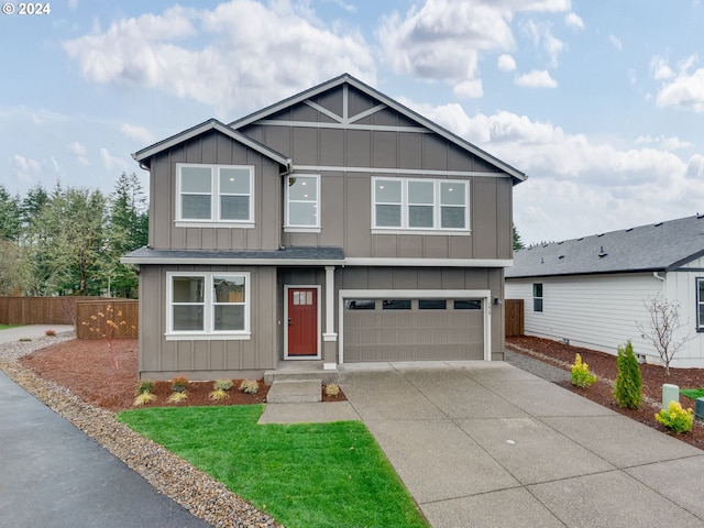 view of front of home with a shingled roof, concrete driveway, board and batten siding, fence, and a garage