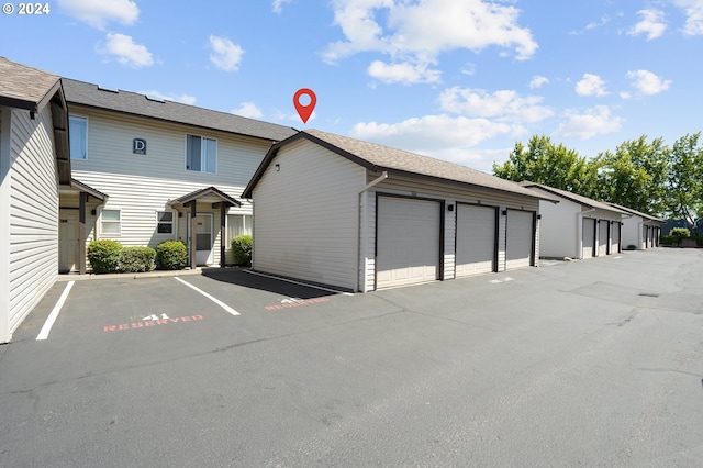 exterior space with a garage