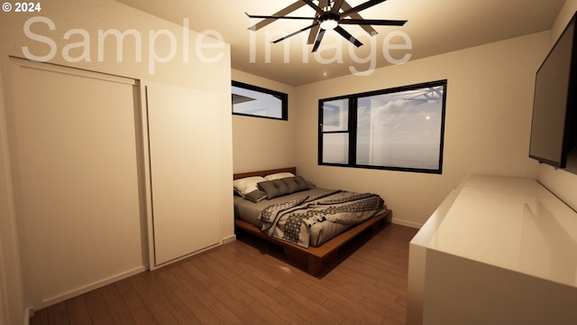 bedroom with hardwood / wood-style flooring and ceiling fan