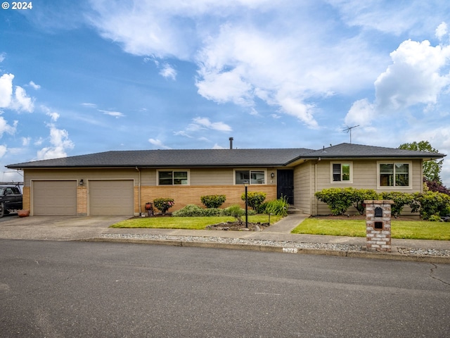 ranch-style home with a garage