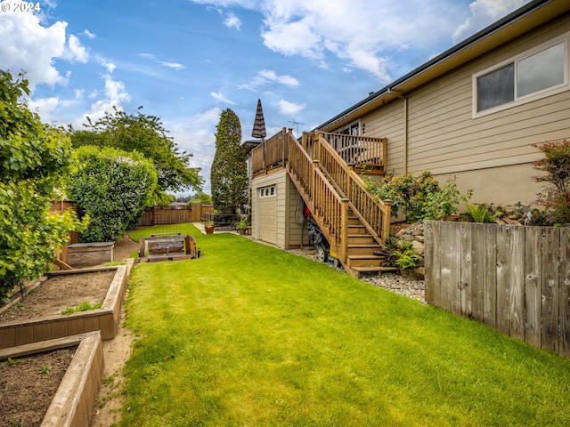 view of yard with a wooden deck