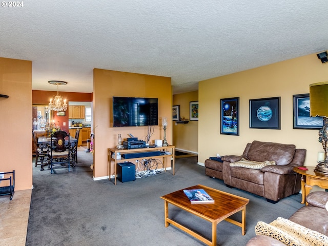 carpeted living room with a textured ceiling and a notable chandelier