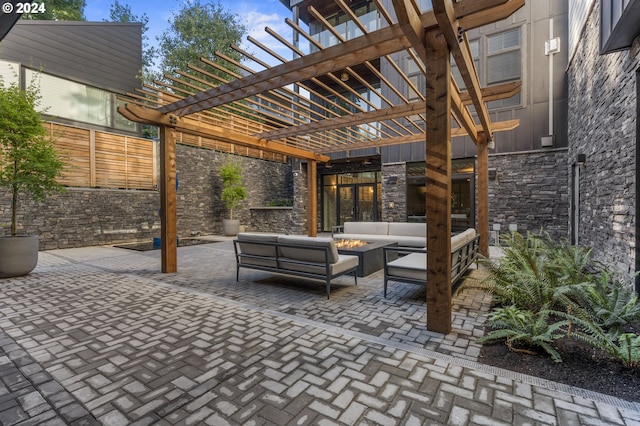 view of patio featuring an outdoor living space and a pergola