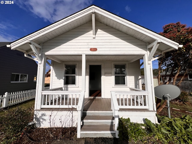 bungalow-style home with a porch