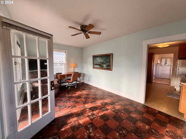 office area with ceiling fan