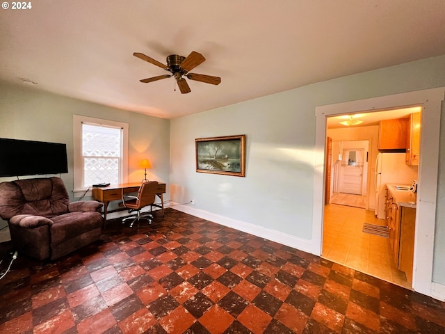 living room featuring ceiling fan